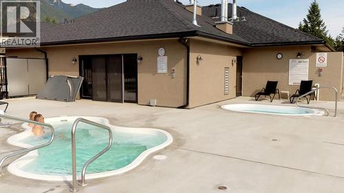 400 Bighorn Boulevard Unit# 416 F, Radium Hot Springs, BC - Outdoor With In Ground Pool With Exterior