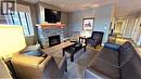 400 Bighorn Boulevard Unit# 416 F, Radium Hot Springs, BC  - Indoor Photo Showing Living Room With Fireplace 