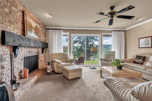 221 West Place, Princeton, BC - Indoor Photo Showing Living Room With Fireplace