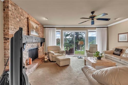 221 West Place, Princeton, BC - Indoor Photo Showing Living Room With Fireplace