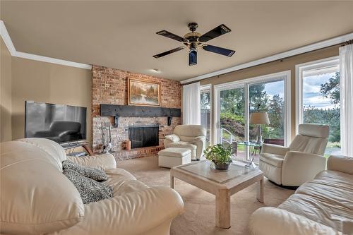 221 West Place, Princeton, BC - Indoor Photo Showing Living Room With Fireplace