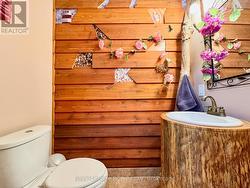 Unique 2pc main floor powder room. - 