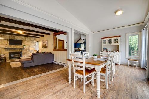 Dining room - 198 Ch. Beaulne, Piedmont, QC - Indoor Photo Showing Dining Room With Fireplace