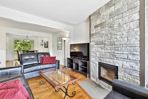 Living room - A-775 Rue Principale, Saint-Sauveur, QC - Indoor Photo Showing Living Room With Fireplace