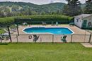 Pool - A-775 Rue Principale, Saint-Sauveur, QC  - Outdoor With In Ground Pool With Backyard 