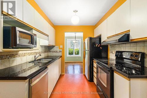 Kitchen w/stainless appliances - 2015 Summerfields Crescent, Ottawa, ON - Indoor Photo Showing Kitchen With Double Sink