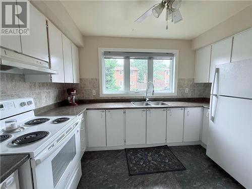 9 Frame Crescent, Elliot Lake, ON - Indoor Photo Showing Kitchen With Double Sink