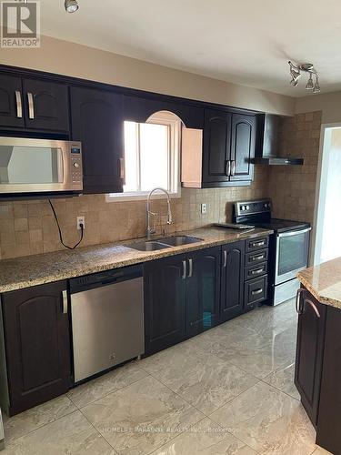 3586 Indigo Crescent, Mississauga, ON - Indoor Photo Showing Kitchen With Double Sink
