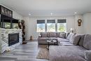 180 Hollywood Crescent, Lillooet, BC  - Indoor Photo Showing Living Room With Fireplace 