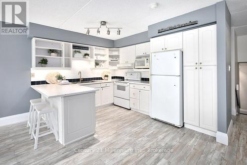 121 - 796404 Grey Road 19, Blue Mountains, ON - Indoor Photo Showing Kitchen