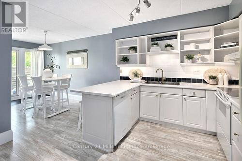 121 - 796404 Grey Road 19, Blue Mountains, ON - Indoor Photo Showing Kitchen With Double Sink With Upgraded Kitchen