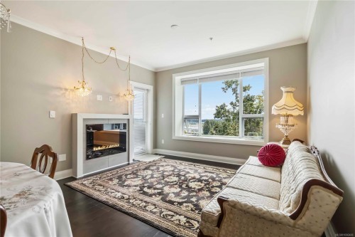 216-1145 Sikorsky Rd, Langford, BC - Indoor Photo Showing Living Room With Fireplace