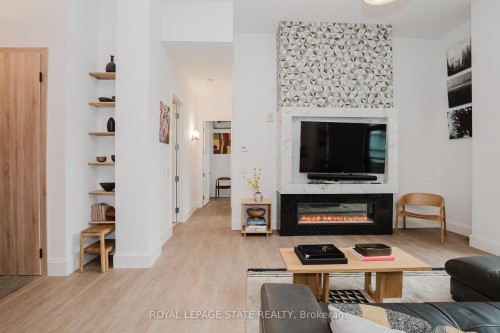 Lph13-118 King Street E, Hamilton, ON - Indoor Photo Showing Living Room With Fireplace