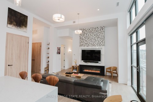 Lph13-118 King Street E, Hamilton, ON - Indoor Photo Showing Other Room With Fireplace