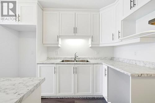 206 - 229 Water Street E, Cornwall, ON - Indoor Photo Showing Kitchen With Double Sink
