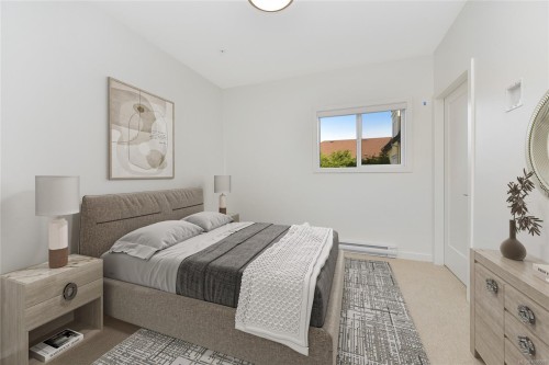 203-9716 Third St, Sidney, BC - Indoor Photo Showing Bedroom
