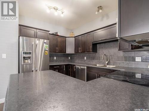4809 Green Rock Road E, Regina, SK - Indoor Photo Showing Kitchen With Double Sink With Upgraded Kitchen