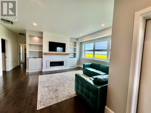 6334 207 Road, Dawson Creek, BC - Indoor Photo Showing Living Room With Fireplace