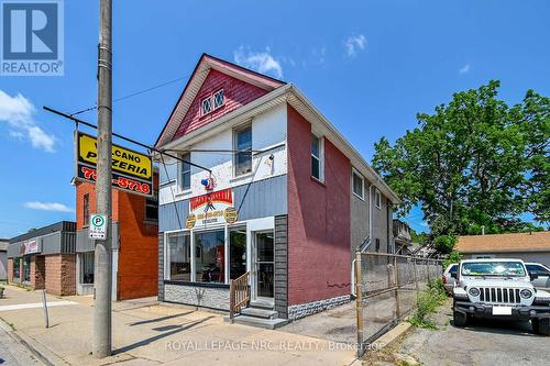 Commercial Building with rental apartment - 256 East Main Street, Welland, ON 
