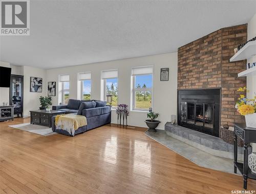 Main Acreage, Biggar Rm No. 347, SK - Indoor Photo Showing Living Room With Fireplace