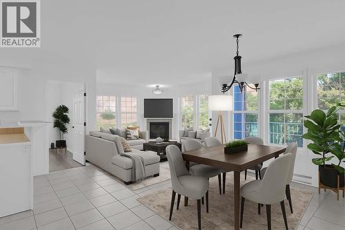 750 Railway Lane Unit# 32, Okanagan Falls, BC - Indoor Photo Showing Dining Room With Fireplace
