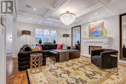 Family Room with Coffered Ceiling - 560 Hancock Way, Mississauga, ON - Indoor With Fireplace
