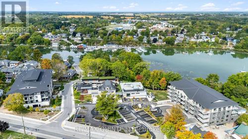104 - 12 Clara Drive, Prince Edward County (Picton Ward), ON - Outdoor With Body Of Water With View