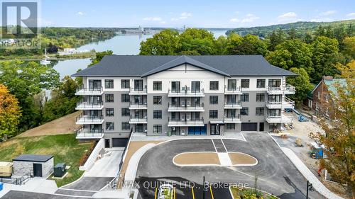 104 - 12 Clara Drive, Prince Edward County (Picton Ward), ON - Outdoor With Balcony With Facade