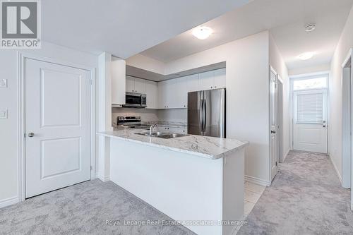 53 - 383 Dundas Street E, Hamilton, ON - Indoor Photo Showing Kitchen With Double Sink