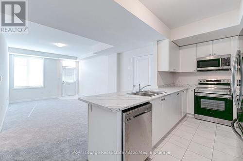 53 - 383 Dundas Street E, Hamilton, ON - Indoor Photo Showing Kitchen With Double Sink