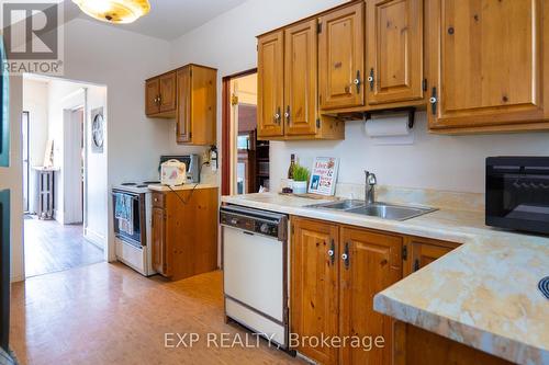 111 Park Row N, Hamilton, ON - Indoor Photo Showing Kitchen With Double Sink