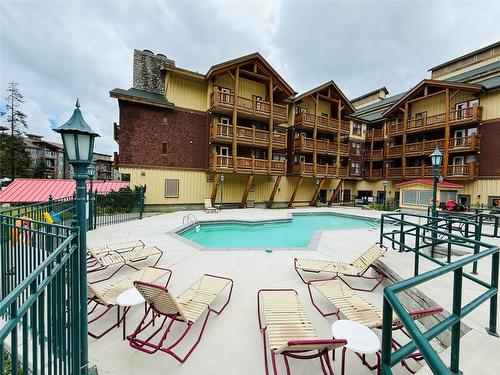 208-500 Stemwinder Drive, Kimberley, BC - Outdoor With In Ground Pool