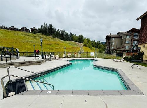 208-500 Stemwinder Drive, Kimberley, BC - Outdoor With In Ground Pool