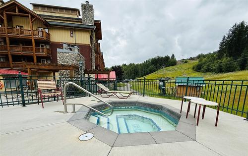 208-500 Stemwinder Drive, Kimberley, BC - Outdoor With In Ground Pool