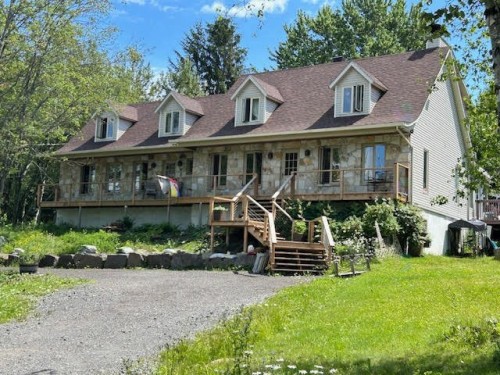 Façade - 202 Ch. Des Chênes, Sainte-Anne-Des-Lacs, QC - Outdoor With Deck Patio Veranda