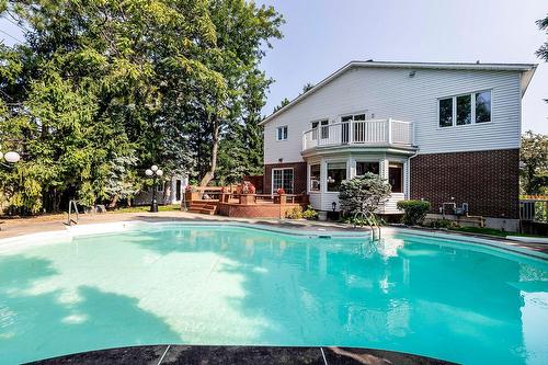 Backyard - 97 Rue Chatillon, Dollard-Des-Ormeaux, QC - Outdoor With In Ground Pool With Backyard