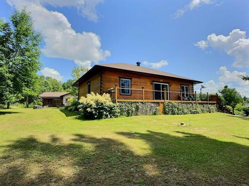 Face arrière - 1997 Ch. Adrien-Denis, Laniel, QC - Outdoor With Deck Patio Veranda