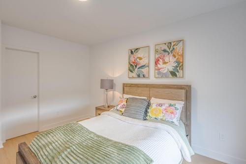 Primary bedroom - 100-100 Rue Du Cantouque, Mont-Tremblant, QC - Indoor Photo Showing Bedroom