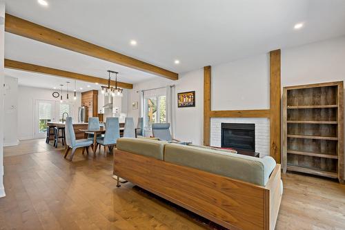 Living room - 573 Rue Charlie-Forbell, Mont-Tremblant, QC - Indoor Photo Showing Other Room With Fireplace