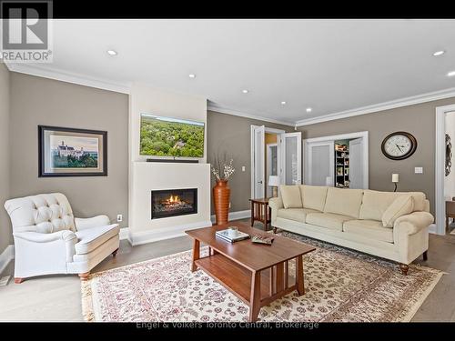 81 Spruce Street, Tiny, ON - Indoor Photo Showing Living Room With Fireplace