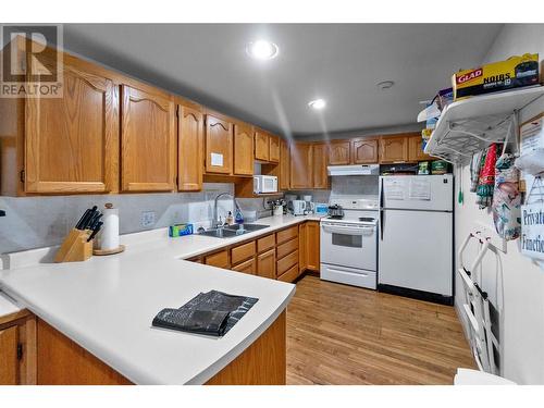 Strata Gathering room - 250 5 Street Se Unit# 313, Salmon Arm, BC - Indoor Photo Showing Kitchen With Double Sink