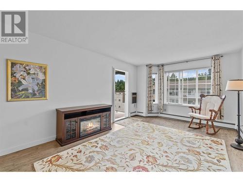 Living room - 250 5 Street Se Unit# 313, Salmon Arm, BC - Indoor Photo Showing Living Room With Fireplace