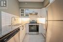 112 - 54 Koda Street, Barrie, ON  - Indoor Photo Showing Kitchen With Stainless Steel Kitchen With Double Sink 