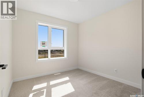 70 Taskamanwa Terrace, Saskatoon, SK - Indoor Photo Showing Other Room