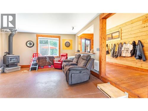 216 27Th Avenue, Creston, BC - Indoor Photo Showing Living Room With Fireplace
