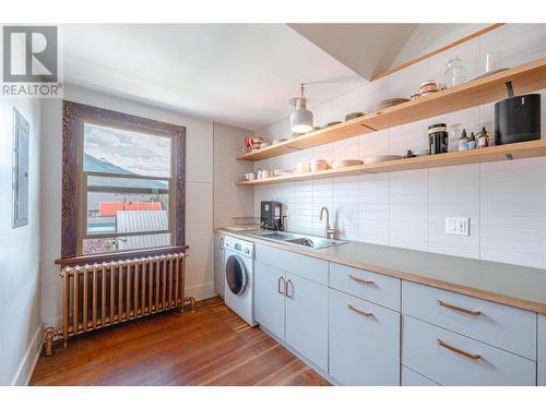 3rd Floor Kitchen - 304 Second Street E, Revelstoke, BC - Indoor Photo Showing Laundry Room