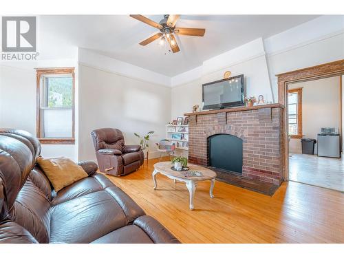 Main Floor Living Room - 304 Second Street E, Revelstoke, BC - Indoor Photo Showing Living Room With Fireplace