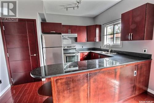 201 10Th Street E, Prince Albert, SK - Indoor Photo Showing Kitchen With Double Sink