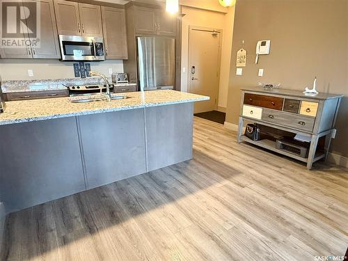 122 121 Willowgrove Crescent, Saskatoon, SK - Indoor Photo Showing Kitchen With Stainless Steel Kitchen With Double Sink