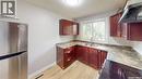 56 Froom Crescent, Regina, SK  - Indoor Photo Showing Kitchen With Double Sink 